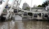 Australia flood woes worsen; Brisbane submerged