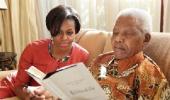 IMAGES: Michelle Obama's candid moments with the Mandelas