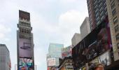 PHOTOS: Yogis take to Times Square on longest day