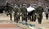 No fuel for cremation, Japan buries its dead