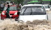 PIX: After blast & quake, heavy rains hit Delhi