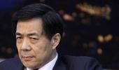 China suspends top leader over murder charges