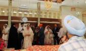 Dr Singh meets Sikhs in Teheran, wife visits gurdwara