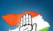 Congress woos Gujaratis with free laptops, 16 pledges