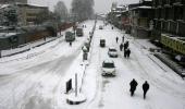 PHOTOS: Snowfall in Srinagar affects normal life