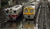 PHOTOS: Heavy rains in Mumbai; trains, flights delayed