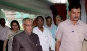 Pranab casts his vote with PM, Sonia by his side