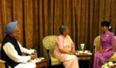 PM meets Suu Kyi in Yangon; hands over Sonia's invite