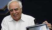 Tiff with Sibal continues as Modi returns Aakash tablets