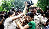 IAC activists caned outside Hooda's home in Delhi