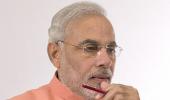 Modi wonders how FDI call came day after Sonia's US trip