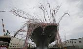 Japan unveils biggest warship since WWII