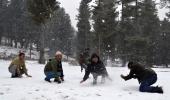 PHOTOS: Srinagar receives season's first snowfall