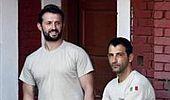 Italian marines return to India, surrender passports