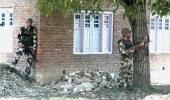 PIX: 3 militants, policeman killed in gunfight in Kashmir