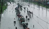 PHOTOS: Heavy rains lash Mumbai; hit rail, road traffic