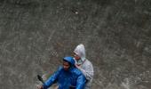 Record rains flood Mumbai, leave it limping