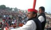 Akhilesh keeps poll promise, doles out laptops to students