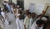 Pakistanis vote in historic polls, 24 killed in violence