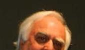 Sibal gets addn charge of law ministry, Joshi gets railways