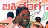 K'taka: Siddaramaiah inducts 28 ministers, keeps tainted away