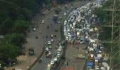 PHOTOS: Chaos on roads after part of Mumbai flyover caves in