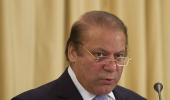 Did Sharif  refer to the PM as 'village woman'?