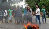 PHOTOS: People block NH-37 in Assam protesting police action