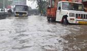 PHOTOS: Heavy rains slow down Mumbai's janata