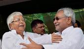 Nitish, Lalu break bread, to contest Bihar polls in alliance