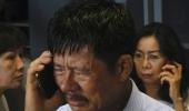 AirAsia QZ8501: Relatives of 162 passengers wait anxiously for news of missing plane