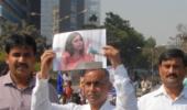 Devyani's father leads protest outside US consulate in Mumbai