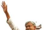 Modi says Nitish nursing PM ambitions, true secularism in Gujarat