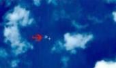 China locates suspected crash site of missing plane