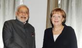 Will look into German language row: Modi assures Merkel