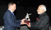 Modi presents Sikh battalion's prized trophy to Abbott at War Memorial