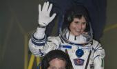 Crew lifts off for six-month space voyage