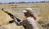 Mayssa Abdo, the gun-toting woman defending her town against ISIS