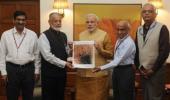 ISRO presents Mangalyaan's first photo to PM Modi