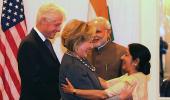 'New grandparents' Clintons keep their date with Modi