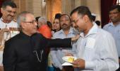 Have some more, no harm: Pranab tells Kejriwal at tea party