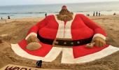 Sudarshan Pattnaik creates world's tallest Santa sand art at Puri