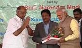 Modi, Pawar share dais, trigger talks of political realignment