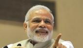 Modi takes a dig at Kejriwal over power bills