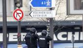 Female suspect in French hostage situation 'on the run'