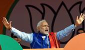 Modi makes poll promises in Delhi; targets 'anarchist' Kejriwal