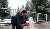 Joy comes to Kashmir as valley witnesses season's first snowfall