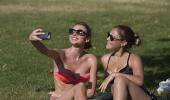 Europeans sweat and soak in sizzling summer