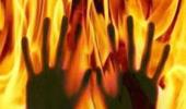 Woman set ablaze at police station dies, probe ordered