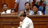 Uproar inside Delhi assembly: BJP MLAs break mike, tear papers